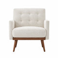 Poltrona in tessuto bouclé crema con struttura in legno